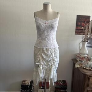 Cream lace ruffle skirt with ribbon detail